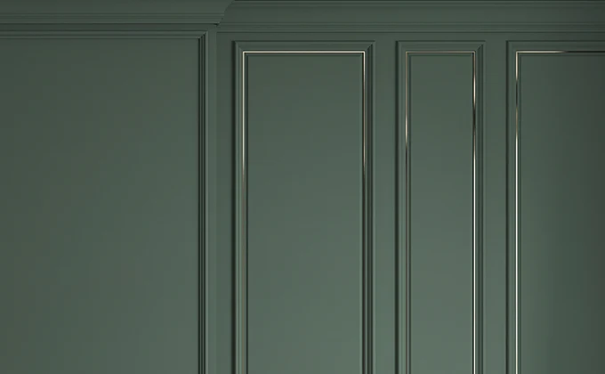 moulures sur mur vert